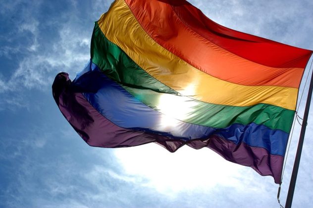 1200px-rainbow_flag_and_blue_skies-